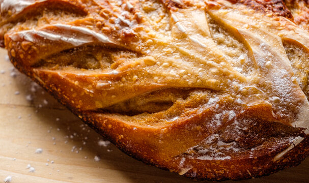 Sourdough Boule loaf on wooden cutting board 