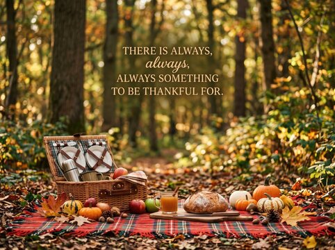 Autumn picnic in a forest with fall decorations, food, and a gratitude quote