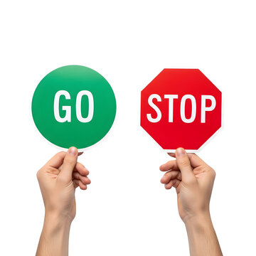 Hands holding go and stop signs
