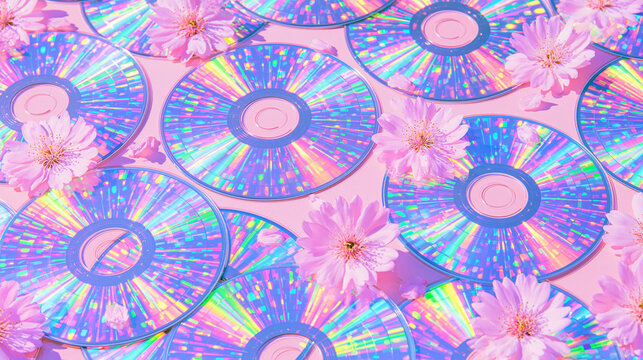 holographic rows of dvds against a pink background with flowers, physical media wallpaper, Physical media