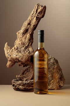 White wine with old driftwood and a piece of granite rock.