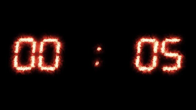 Digital countdown timer with glowing fiery red numbers counting down to zero. Time display for technology, deadline, sports, project launch.