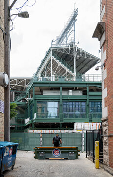 A vehicle barrier blocks an alley behind Wrigley Field, part of a 32 million dollar security upgrade project, Chicago, Illinois, July  2026.