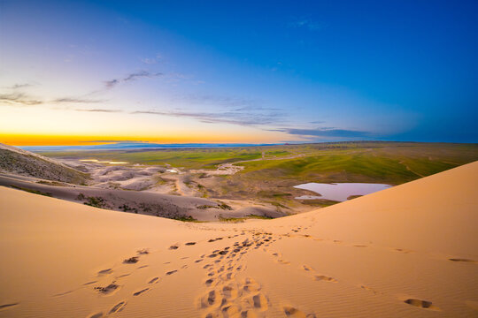Steps down Gobi Khongoryn Els Dune Mongolia