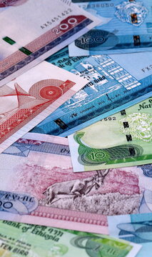 Ethiopian birr money bills pile on table. Ethiopia banknotes of ETB currency close up.