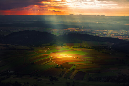 Sunlit Farmland Landscape in Austria, beautiful view with the sun ray