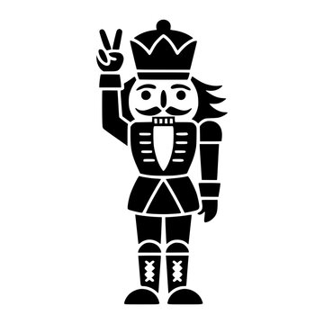 Nutcracker Holding Up Peace Sign