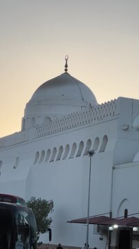 Exterior dome and beautiful wooden minbar inside Masjid Al Qiblatain in Medina.