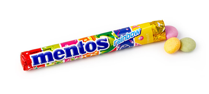 Mentos rainbow chewy dragees with fruit flavors on a white background