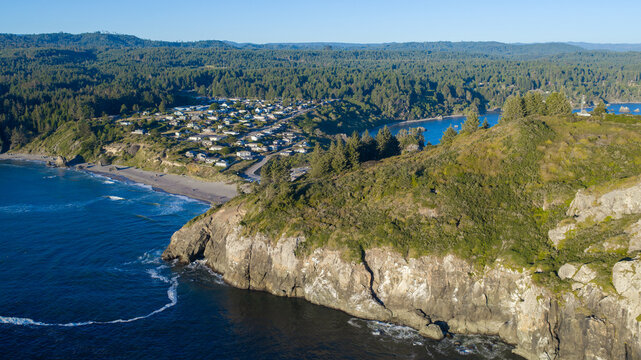 City of Trinidad nestled on California Coast, seen beyond Trinidad head in the foreground