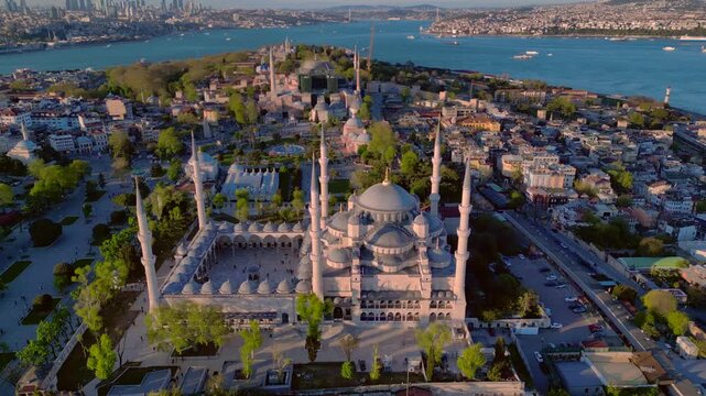 Blue Mosque showcasing Istanbul skyline and Bosphorus strait. dMajestic aerial view rone