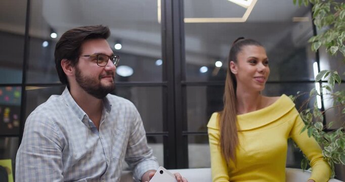 Couple consulting with professional in business office discussing plans and ideas for future growth and development