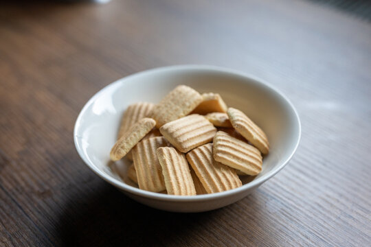 Close-up of homemade baby biscuits served in white bowl