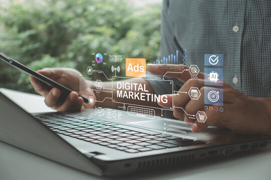 Businessman using smartphone and laptop with digital marketing dashboard, AI analytics, online advertising, SEO strategy, social media, e-commerce, and data-driven business growth.