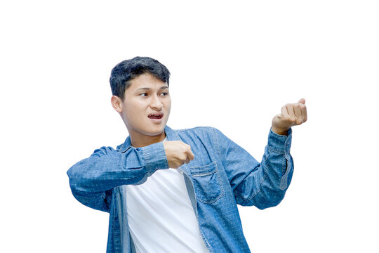 Young man gesturing with hands against a white background