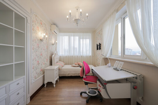 Classic kids bedroom with study desk
