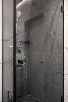 Grey shower cabin in luxury bathroom