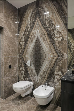 Luxury marble bathroom interior with toilet