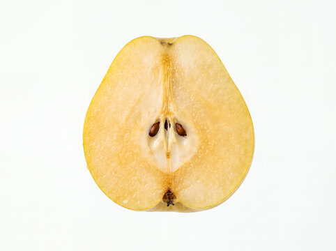Pear half cut showing seeds isolated on white background.