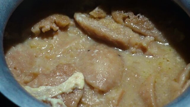 Date juice was cooked and turned red, and the Chitai Pitha was dipped in it, now milk is poured into it, which will be called Dudh-Chitai Pitha.