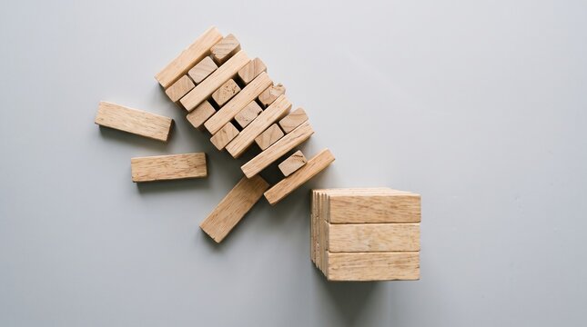 Wooden Block Tower Near Collapse as One Displaced Block Causes an Unstable Structure Viewed from Directly Above