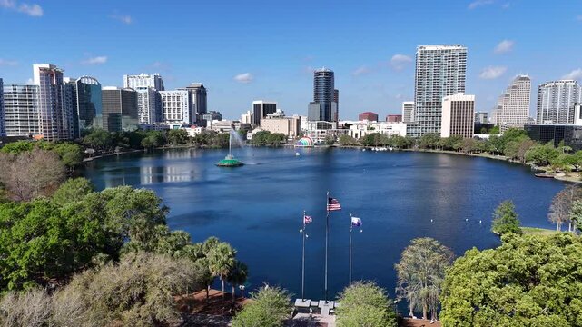 Flying towards the fountain at Lake Eola in downtown Orlando in Orange County, Florida.
