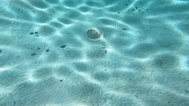 Underwater pool showing pool drain 