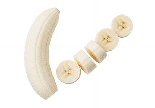 A peeled banana, with its left half intact and its right half meticulously sliced into four individual, perfectly round segments, white background isolated