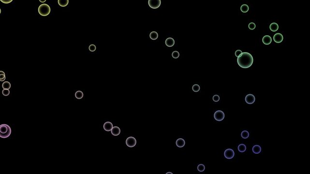透明背景を浮遊する色とりどりの幻想的な泡と光の粒子