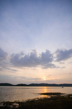 Serene Sunset Over Khu Reservoir, a Popular Tourist Attraction
