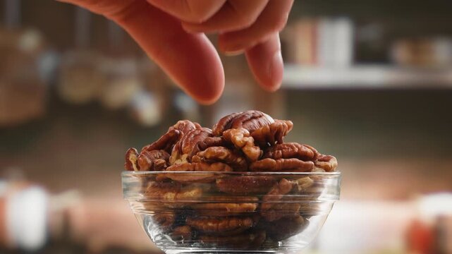 Fresh Pecan Nuts in Bowl and on Table, Close Up of Healthy Organic Nut Snack, Natural Food Ingredient for Cooking, Baking and Healthy Diet, Shop and Market