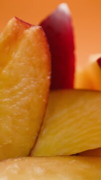 Fresh ripe apricots, peach and nectarine isolated on a white background. Colorful summer stone fruits with natural texture, healthy organic food, vegan nutrition, fresh harvest, juicy seasonal produce