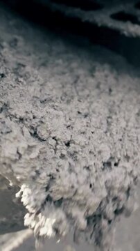 Close-up view of textured gray industrial material