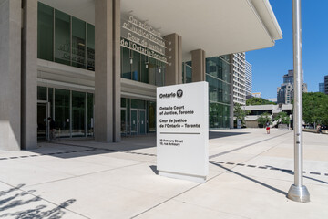Fototapeta premiumToronto, Ontario, Canada - August 5, 2026: Ontario Court of Justice building located on Armoury Street in Toronto, Canada. The Ontario Court of Justice is the provincial court of record. 