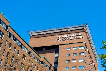 Fototapeta premium Toronto, Ontario, Canada - August 5, 2026: Ted Rogers Centre for Heart Research building located on University Avenue in downtown Toronto, Canada. 