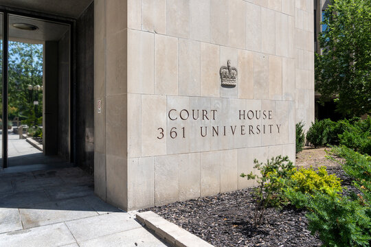 Toronto, Ontario, Canada - August 5, 2026: The signage for Toronto Courthouse which houses the Ontario Superior Court of Justice at 361 University Avenue in downtown Toronto, Canada. 