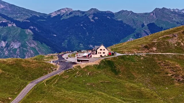 Col d'Aubisque mountain pass road and building in the french Pyrenees, France