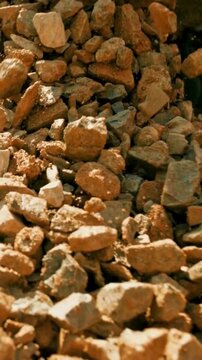 Raw Brown Rocks Falling Down in a Quarry