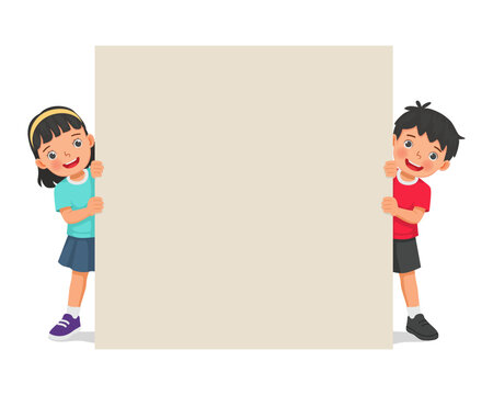 Two children peeking from behind a big blank banner