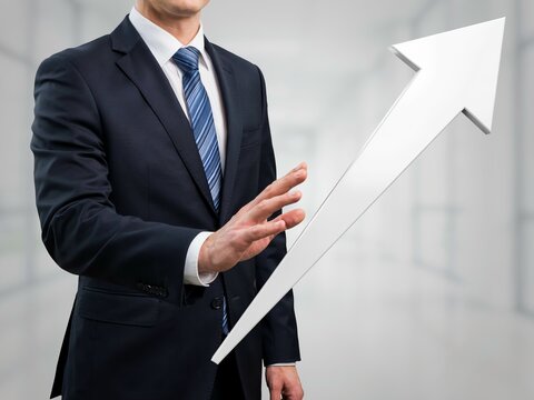 Business Growth And Success Concept With Professional Presenting Large Upward Arrow For Strategic Progress
