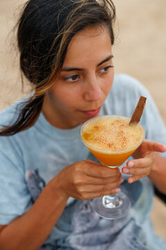 A cocktail, with cinnamon bark