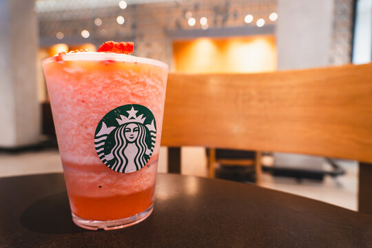 Close Up View of Strawberry Cream Frappuccino Blended Beverage with Whipped Cream and Fresh Strawberry Topping at Starbucks, Bangkok Thailand on July 2026