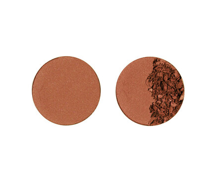 Brown blusher or eyeshadow refills vivid powder round form isolated on white background. Beauty product cosmetic powder for makeup with pressed matte texture and broken particles, top view objects.