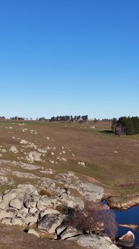 Aerial View of Granite Boulders and Winding River in Rural Australia