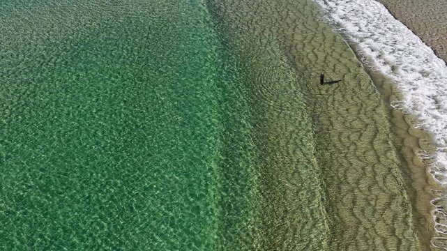Aerial View of Lone Surfer in Turquoise Water at Crescent Head