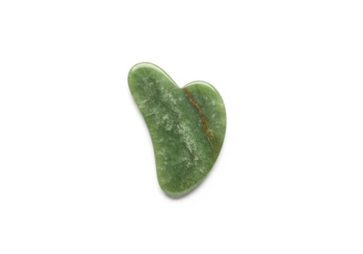 Green jade gua sha stone for facial massage