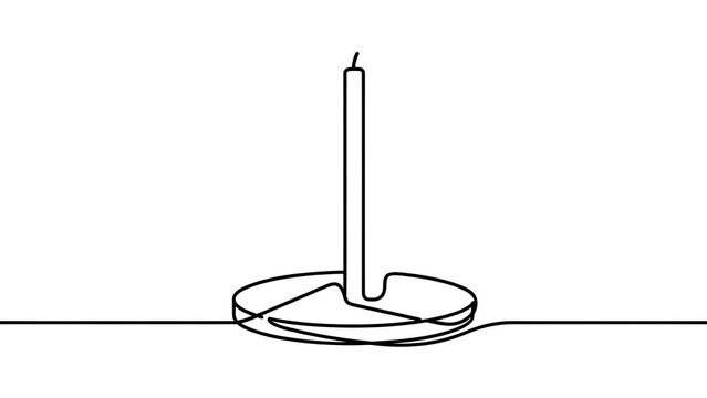 Single lit candle on holder white background.