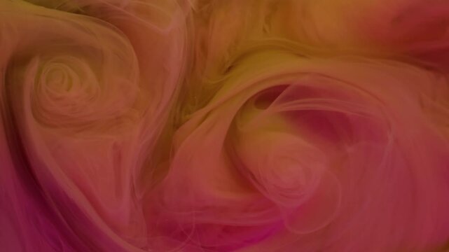 Ink drop. Paint background. Defocused pink yellow color texture fume vapor warm bright splash spreading on art acrylic abstraction.
