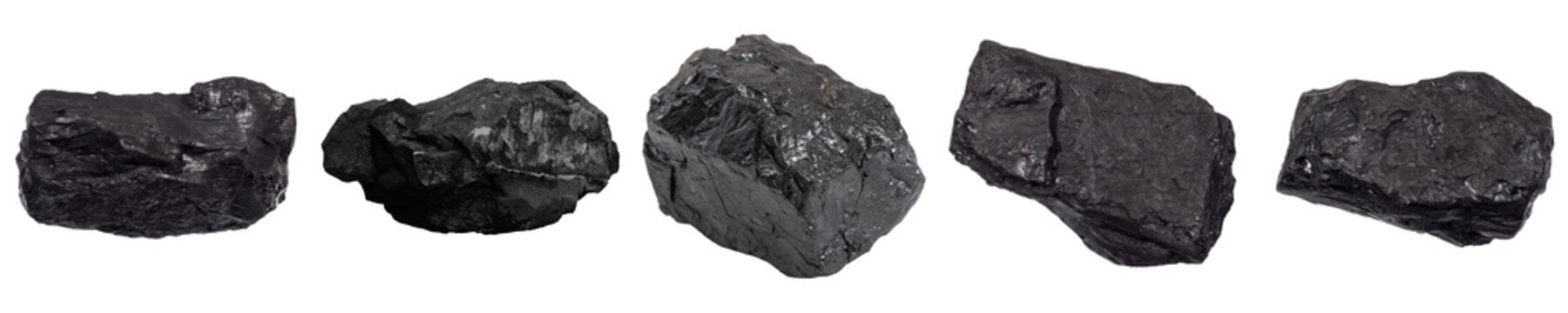 Five irregular pieces of black coal, showcasing natural textures and rough surfaces, isolated on transparent background.