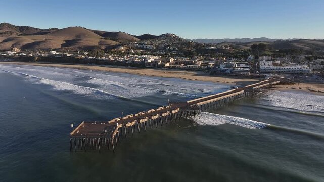 Aerial view of the boardwalk along the beach in Pismo Beach, California, USA.